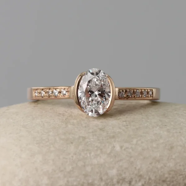 The Faughan: 18ct Rose Gold Partial Collet Oval Diamond or Moissanite Engagement Ring with Pave Set Shoulders