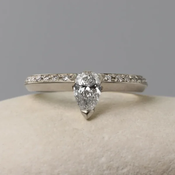 The Leacann: 18ct White Gold Pear Cut Diamond or Moissanite Engagement Ring with Pave Set Shoulders