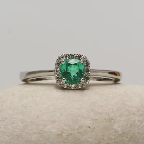 The Invergeldie: Recycled 950 Platinum Emerald and Diamond Halo Engagement Ring