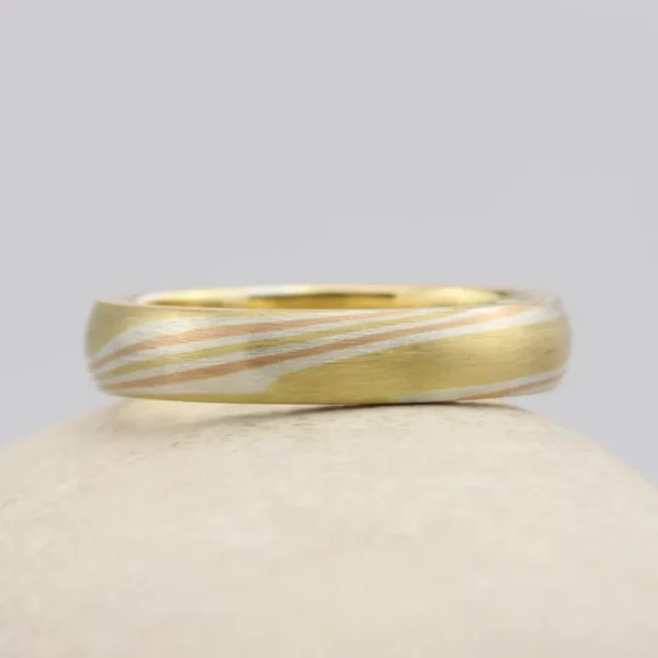 The Takizawa: Yellow Gold Mokume Gane Wedding Ring with Rose Gold and Silver