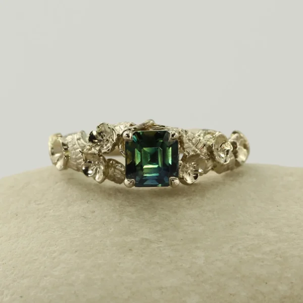 The Elan: Handmade 18ct White Gold Emerald Cut Sea Green Sapphire Floral Engagement Ring